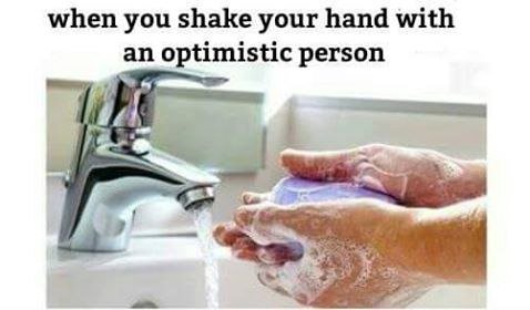 when you shake your hand with an optimistic person