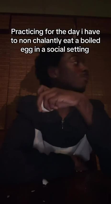 egg in a social setting to nonchalantly eat a boiled