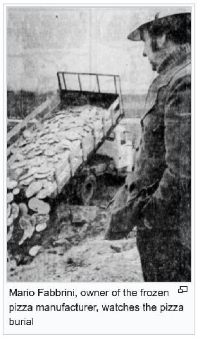 у у. и 716 a Mario Fabbrini, owner of the frozen pizza manufacturer, watches the pizza burial
