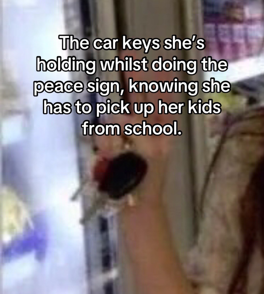 саг keys she’s holding whilst doing the peace sign, knowing she has to pick up her kids from school.