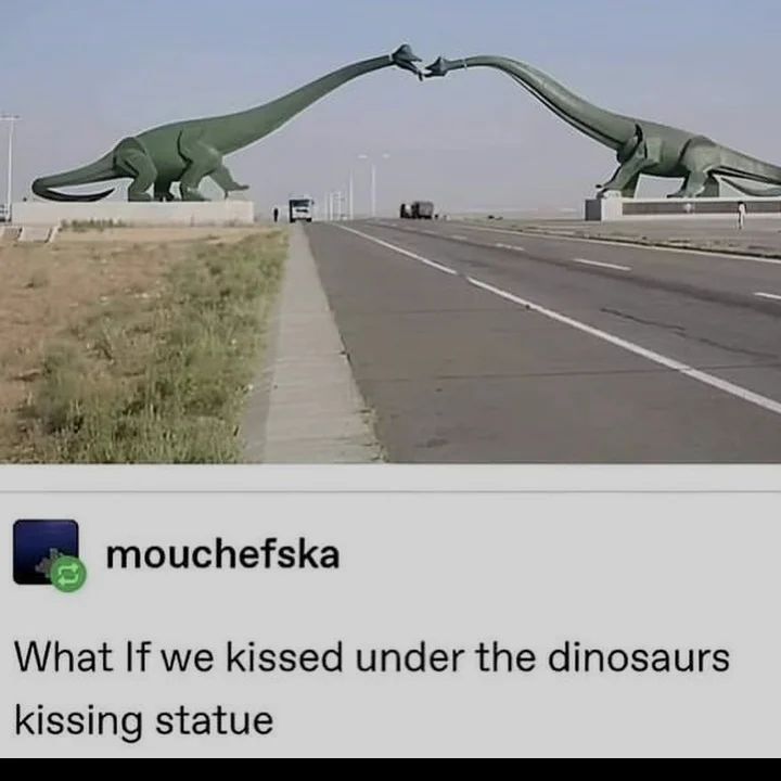 44 mouchefska What If we kissed under the dinosaurs kissing statue