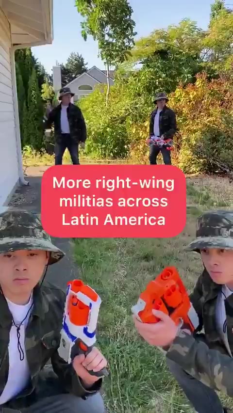 z militias across 2) ‚< Latin America es