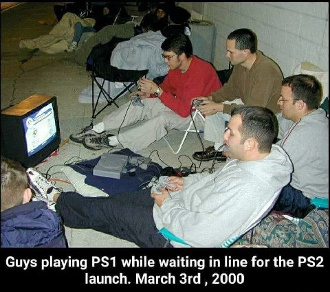 2 Guys playing while waiting line for the launch. March 2000