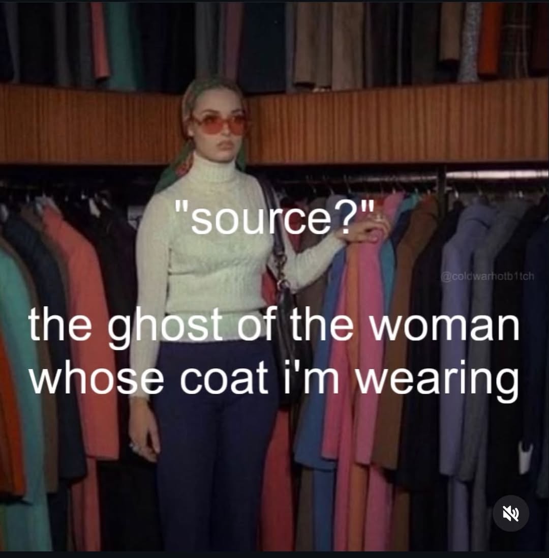 the of the woman whose coat wearing