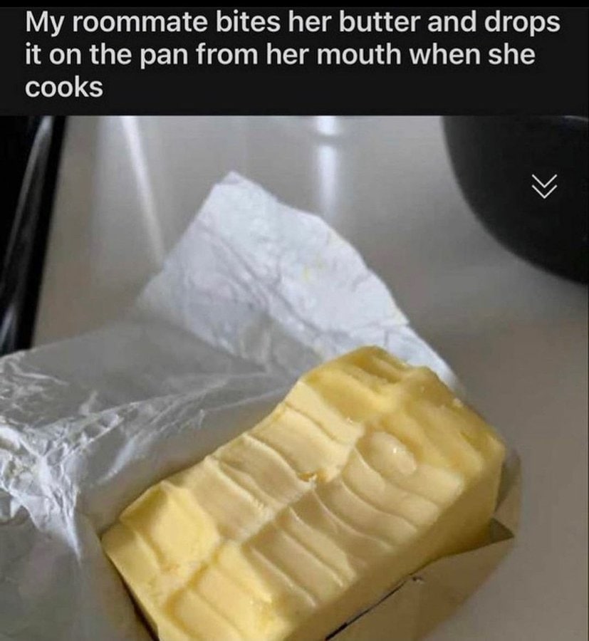 roommate bites her butter and drops it on the pan from her mouth when she cooks