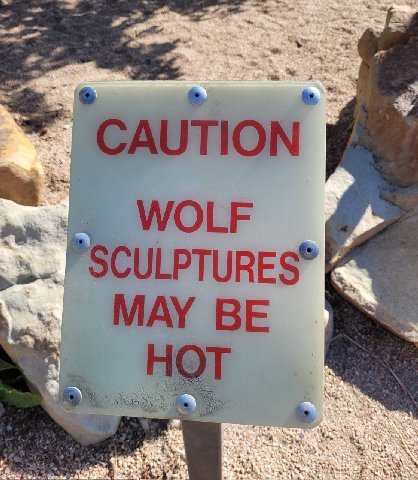 TION WOLF CULPTURES® MAY BE А