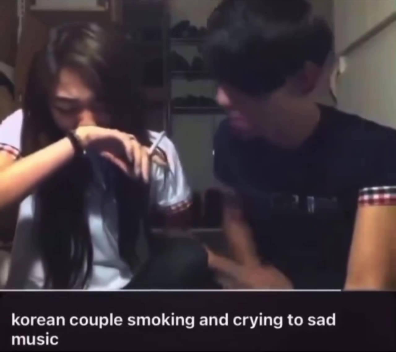 korean couple smoking and crying to sad