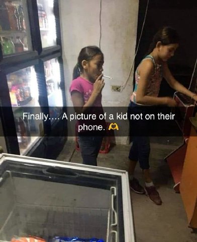 Finally Apicture of a kid not on their phone.