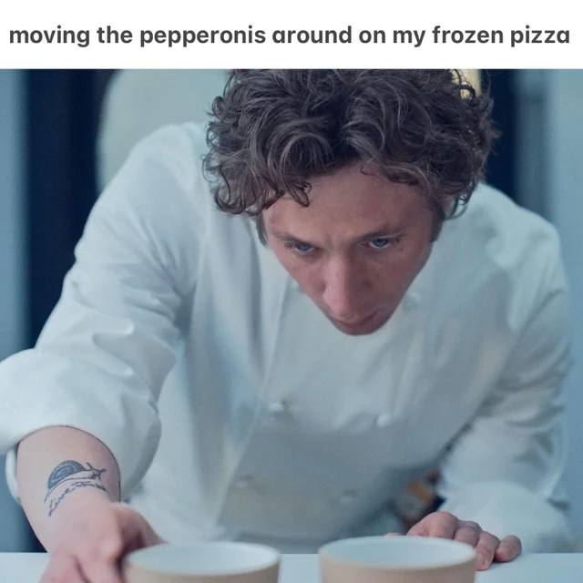 moving the pepperonis around my frozen pizza