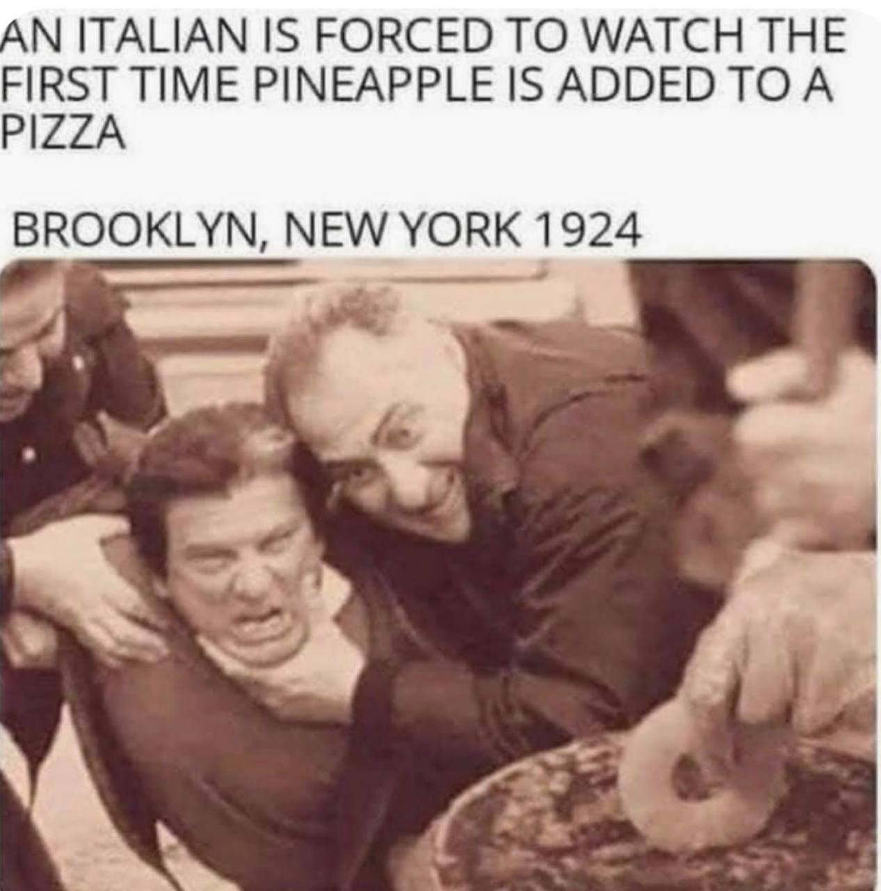 AN ПАПАМ IS FORCED ТО WATCH THE FIRST TIME PINEAPPLE 1$ ADDED TOA PIZZA BROOKLYN, NEW YORK 1924 у 5
