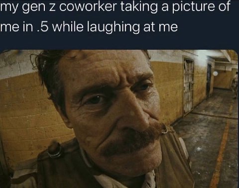 my деп coworker taking а picture of me in .5 while laughing at me