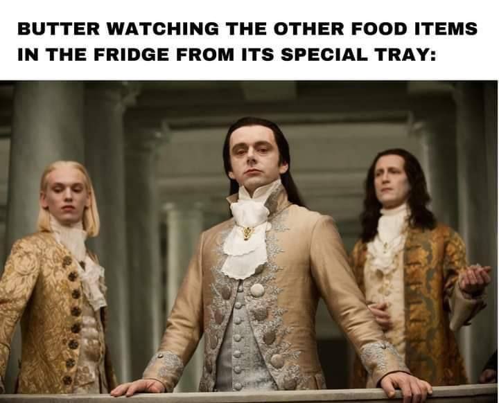 BUTTER WATCHING THE OTHER FOOD ITEMS IN THE FRIDGE FROM ITS SPECIAL TRAY: ‘у
