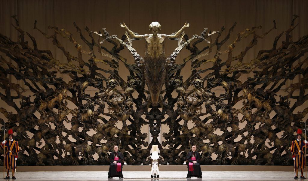 It's, really looks weird at best..
There was pictures which draw parallels of some cloth of priests to cloth of pagan priests too..