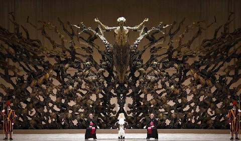 It's, really looks weird at best..
There was pictures which draw parallels of some cloth of priests to cloth of pagan priests too..