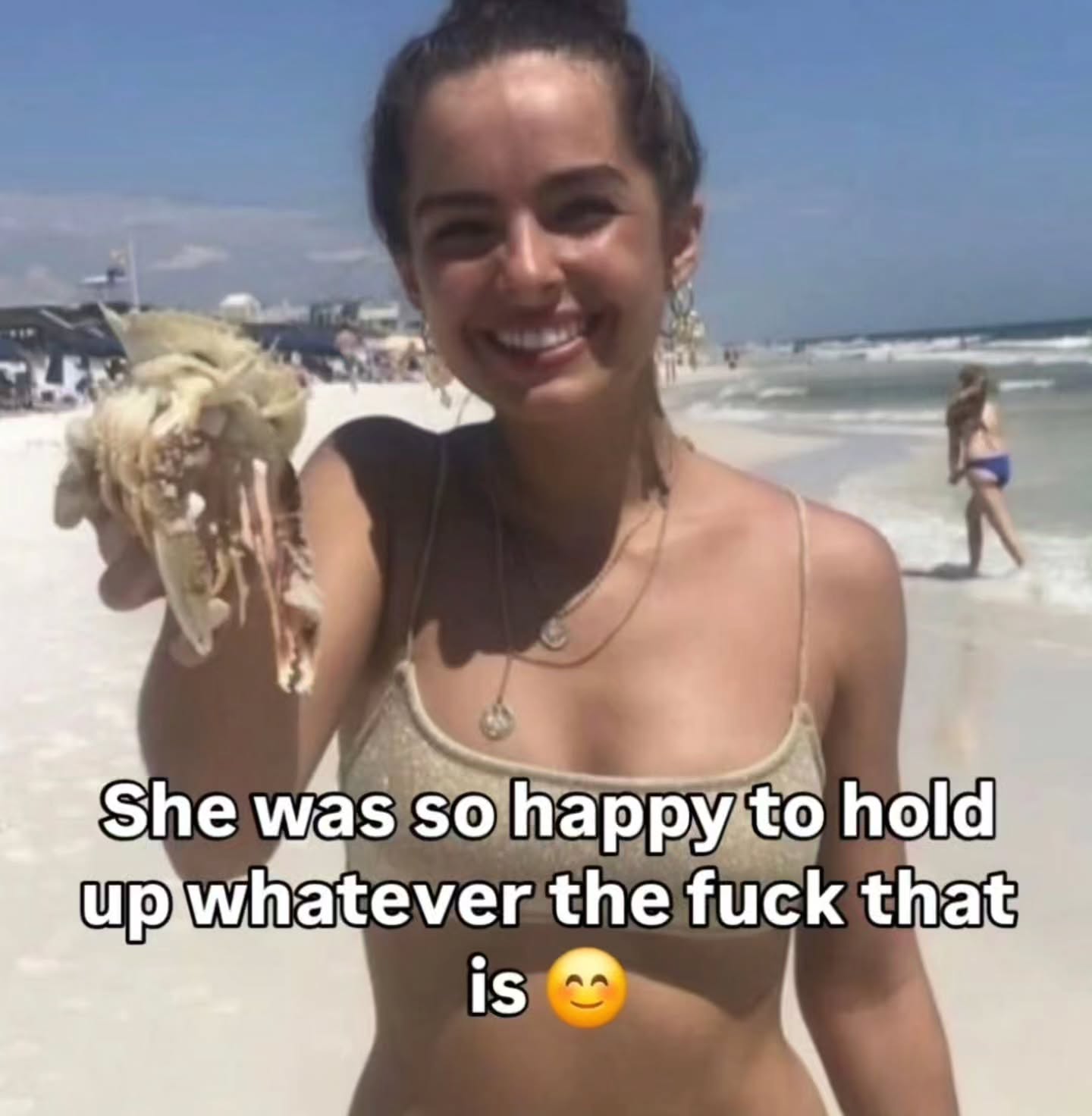 She was so happy to hold up\whatever the fuck that is