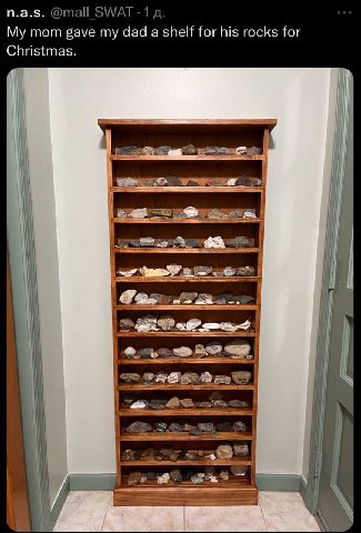 @mall SWAT 1 mom gave dad а shelf for his rocks for Christmas. i И 1