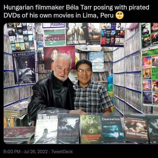 Hungarian filmmaker Béla Тат posing with pirated DVDs of his own movies in Lima, Peru 7 4 7 9:00 Jul 26, 2022 TweetDeck