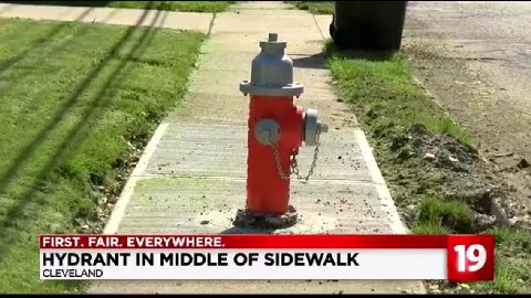 ake bbe 7. и FIRST. FAIR. EVERYWHERE. HYDRANT IN MIDDLE OF SIDEWALK 19 CLEVELAND