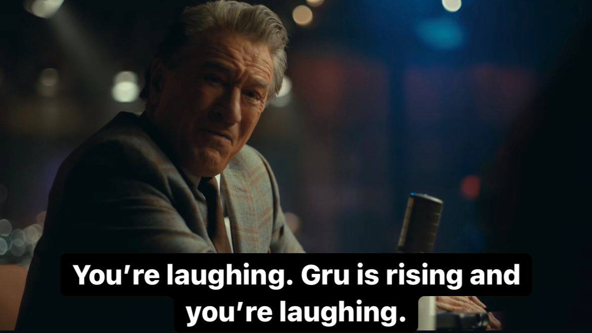laughing. Gru is rising and laughing.