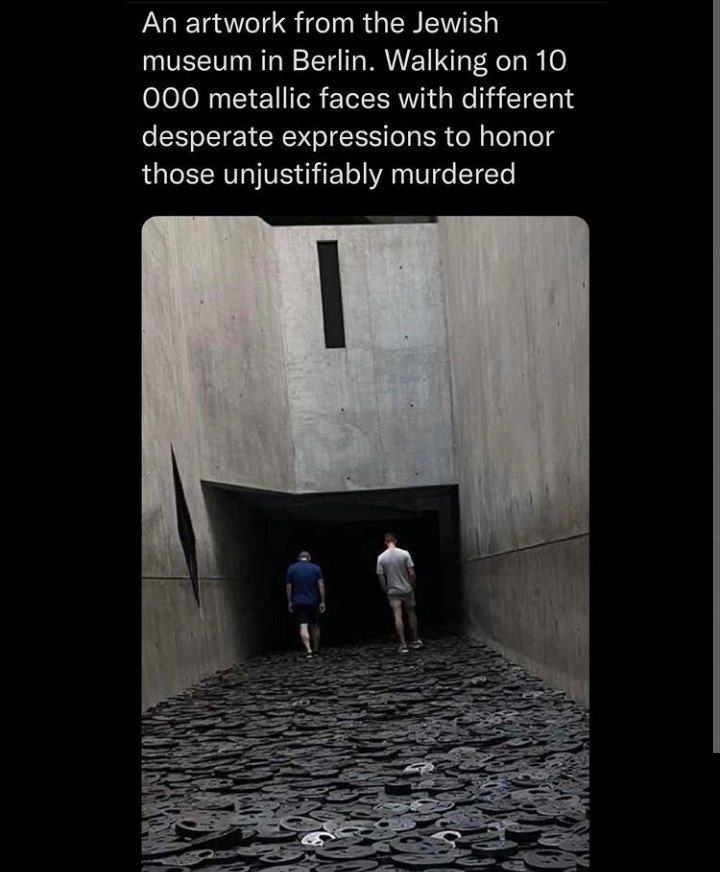 An artwork from the Jewish museum in Berlin. Walking on 10 ООО metallic faces with different desperate expressions to honor those unjustifiably murdered 6 1 4