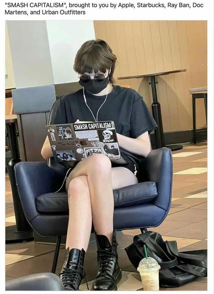 "SMASH CAPITALISM", brought to you Apple, Starbucks, Ray Ban, Doc Martens, and Urban Outfitters