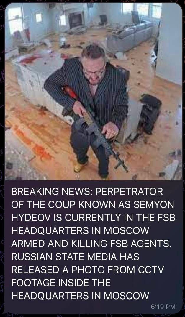 в a к BREAKING NEWS: PERPETRATOR OF THE COUP KNOWN AS SEMYON HYDEOV IS CURRENTLY IN THE FSB HEADQUARTERS IN MOSCOW ARMED AND KILLING FSB AGENTS. RUSSIAN STATE MEDIA HAS RELEASED A PHOTO FROM CCTV FOOT