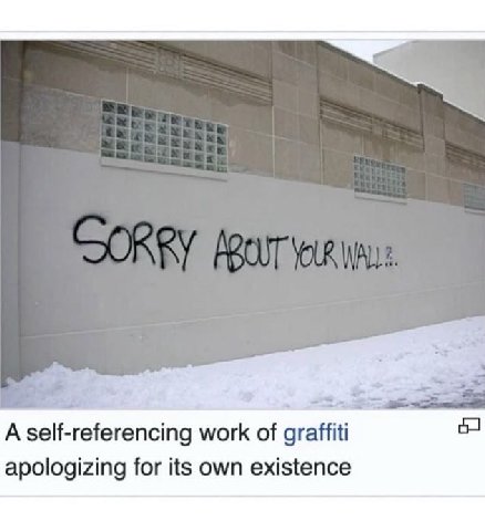 A self-referencing work of graffiti apologizing for its own existence