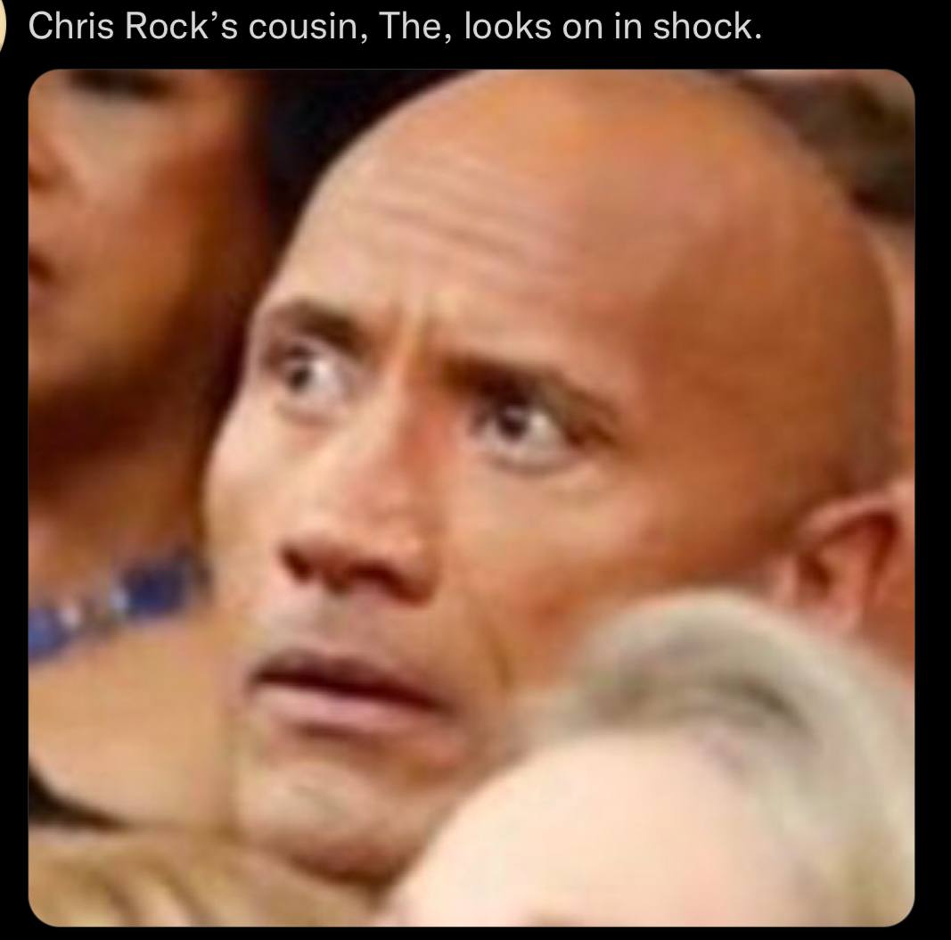 Chris Rock’s cousin, The, looks in shock.
