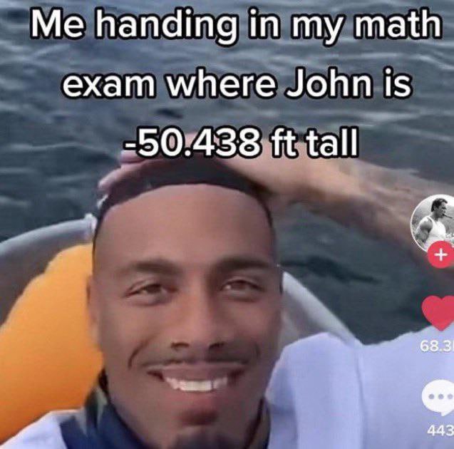 Me handing in my тай exam where John is -50°438 tall 443