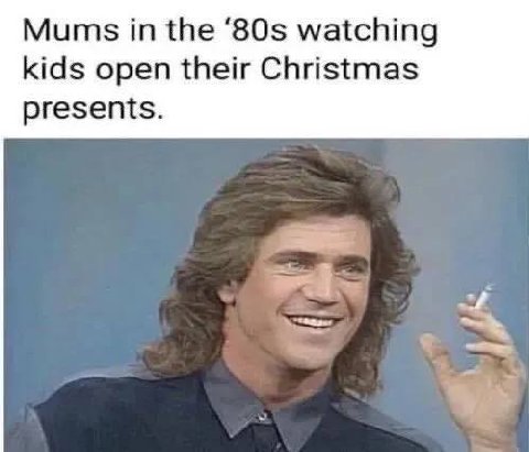Mums the watching kids open their Christmas presents.