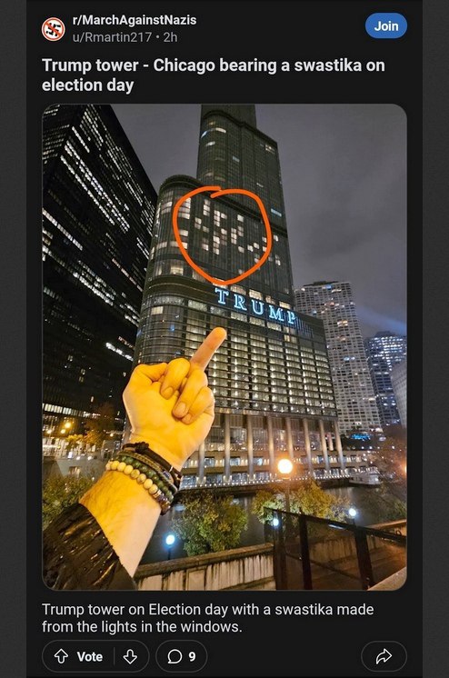 t/MarchAgainstNazis u/Rmartin217 Trump tower Chicago bearing a swastika on election day NAS Tre За 4 у 72 Trump tower on Election day with a swastika made from the lights in the windows. Vote