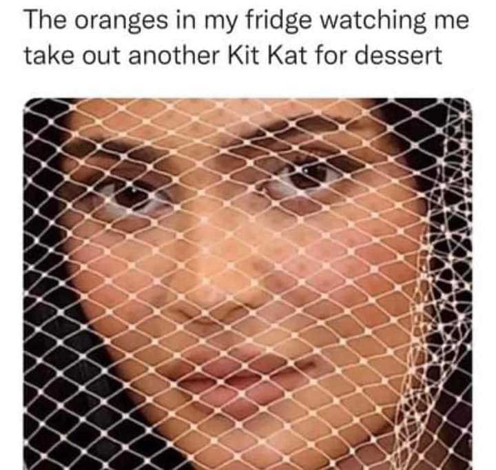 The oranges in my fridge watching me take out another Kit Kat for dessert